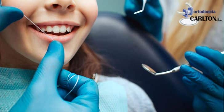 analizar la cobertura del seguro dental para las intervenciones con coronas